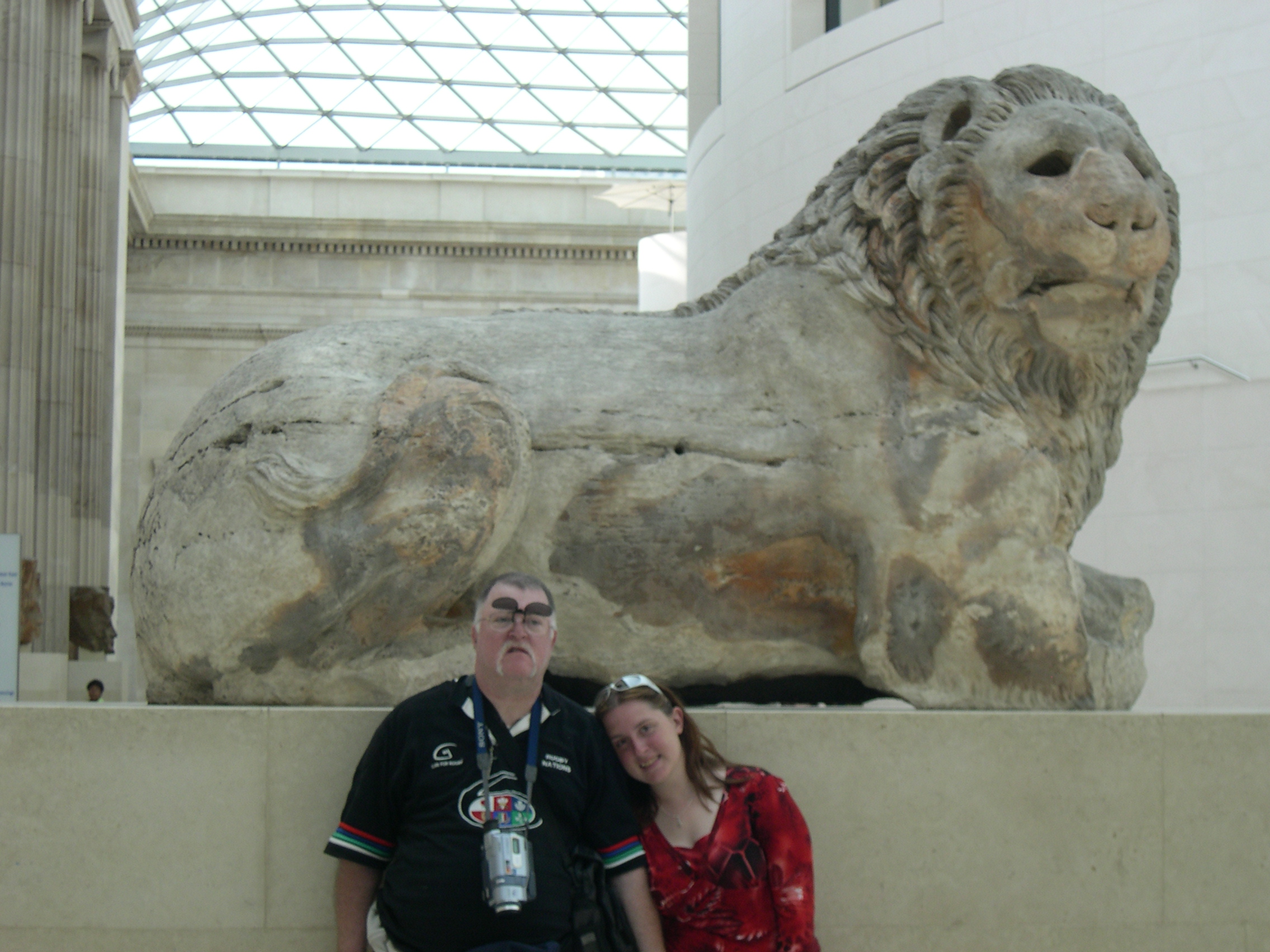 Howie and Beth and one of the Library Lions
